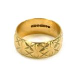 A 9ct gold wedding band, of cross hatched floral design, size O, 4.9g.