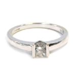 An 18ct white gold diamond solitaire ring, with round brilliant cut tension set stone, measuring app