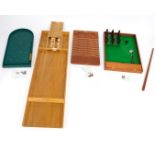 A group of vintage games, to include a Jacques board, a shove halfpenny Jacques board, and a table s