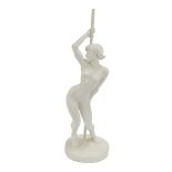 A composition figure of a nude pole dancer, on circular base, 63cm high.