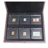 Philately. A cased set of presentation post worn stamps, comprising six cased stamp sets, with certi