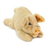 A Steiff pig, with yellow crest label, No 5415, 28cm wide.