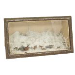 A 19thC Diorama of Russian scene, in glass display case, with figures on sledge, shooting wolves ea