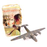 A scratch built model of a Liberator B24 Bomber, and a tin plate battery operated bar tender made by