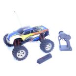 A TQ3 remote control monster truck, with controller.