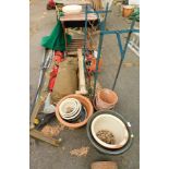 Garden wares, including a metal bottle rack, terracotta planters, cover, croquet set, petrol hedge t