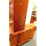 A yew wood breakfront low sideboard, and a modern mahogany swivel CD rack. (2)