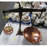 An Avery Birmingham table scale with brass mounts, copper pans and two brass weights.