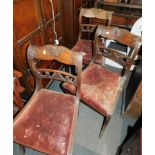 Three Regency mahogany dining chairs.