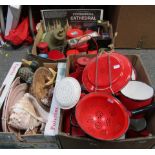 A group of shells, kitchen utensils, metalware, colander, watering can, enamel style and other red