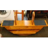A child's two way see-saw boat, with pierced handles, 53cm high.