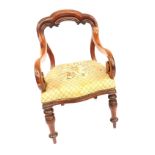 A Victorian mahogany framed dining chair, with tapestry rose seat and scroll back and arms.