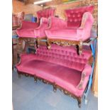 An Italian style salon suite, comprising a three seater sofa and two matching armchairs, each with m