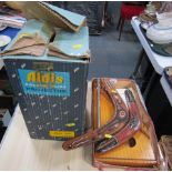 Two painted boomerangs, zither, partially boxed, and an Aldis partially boxed slide projector. (4)