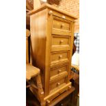 A pine five drawer chest, with galleried back.