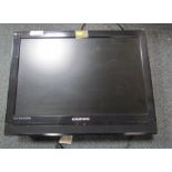 A Grundig 22" HMDI flat screen television, with remote.