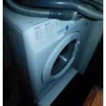 An Indesit washer/dryer.