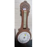 An Edwardian oak banjo barometer. (AF)