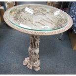 An oriental resin elephant glass topped table.