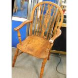 A wheelwright's wheel back Windsor chair.