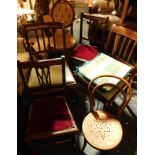A group of chairs, comprising a cabriole backed dining chair, bentwood chair, two dining chairs, rus