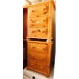 A pair of pine three drawer bedsides.