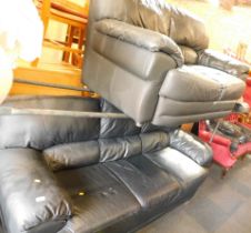 A black leather three seater and two seater sofa set. (2)