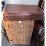 A brown leather travel case, and a large wicker basket. (2)