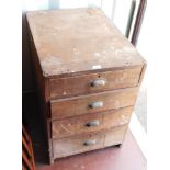 A pine four drawer tool chest, lacking contents.