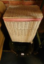 A green rush basket and two wicker linen baskets. (3)