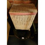 A green rush basket and two wicker linen baskets. (3)