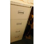 A steel four drawer filing cabinet.