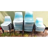 Blue plastic stacking chairs with tubular frames. (a quantity)