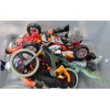 A group of Action Man figures, comprising four Action Men, buggy, bike and other toys. (1 box)