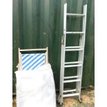 A striped deck chair, aluminium two tier domestic stepladder, and a camping table. (3)
