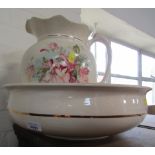 The Royal Hotel Thurso wash bowl, and a floral transfer printed jug. (2)