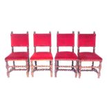 A set of four oak dining chairs, red velvet with button detail on barley twist columns. (4)