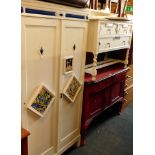 A white painted double wardrobe, inset with Italian style tiles, and a matching dressing table. (2)