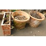 Four terracotta planters, comprising a pair of rectangular and a pair of circular planters.