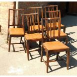A set of six Edwardian mahogany carved back dining chairs. (6)