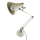 A metal framed Anglepoise lamp, on circular foot with cone shade, indistinct label, 67cm high.