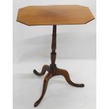 A 19thC mahogany tilt top table, the rectangular top with canted corners, on a turned column and tri