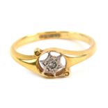 A 18ct gold dress ring, with central star set with small diamonds, on a shaped shank, ring size L-M,