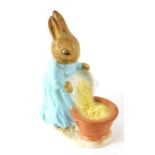 A Beatrix Potter figure Cecily Parsley, gold oval mark beneath, 8cm high. (AF)