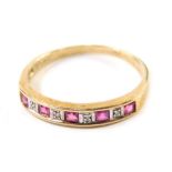 A 9ct gold dress ring, baguette cut with pink and white stones, size T, 1.9g all in.