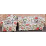 A late 19th/early 20thC drop arm Chesterfield sofa, with loose cushions, on bun feet, 163cm wide, an