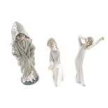 Various Lladro figures, comprising a Daisa figure of a girl A-28, 22cm high, Nao Girl Yawning and an