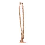 A 9ct gold double Albert watch chain, centred by a T-bar, 38cm long, 48.8g.