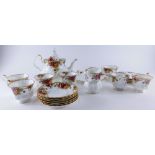 A Royal Albert Old Country Roses part tea service, to include teapot, 20cm high, sandwich plate, cup