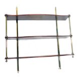 A mahogany and brass wall shelf, with three shaped tiers, on reeded pillar supports, 80cm high, 76cm